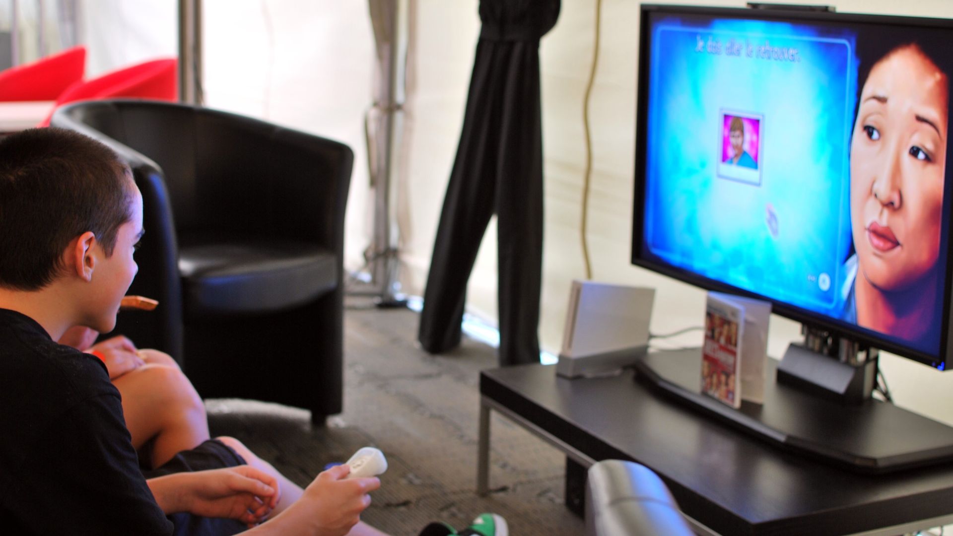 File:Boy playing wii game.jpg