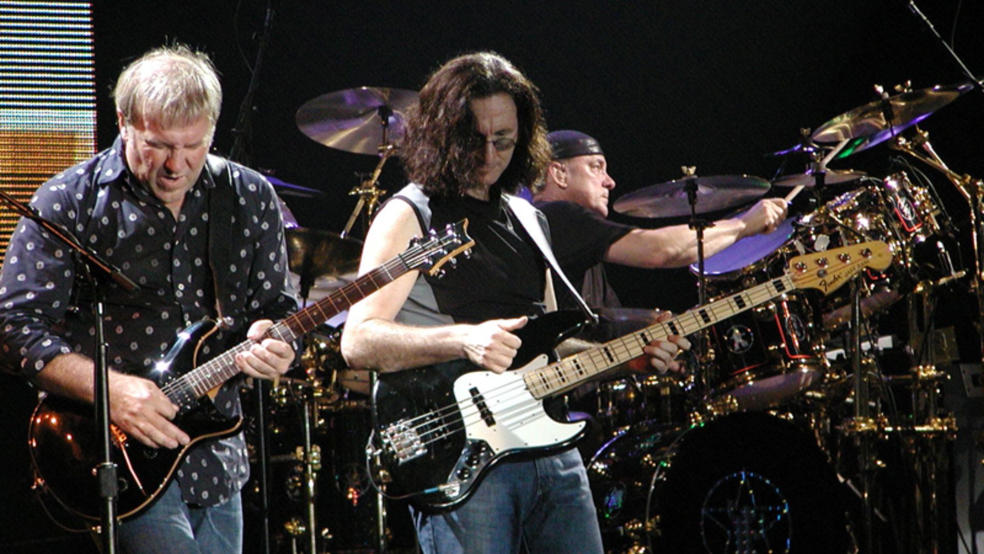File:Rush-in-concert.jpg