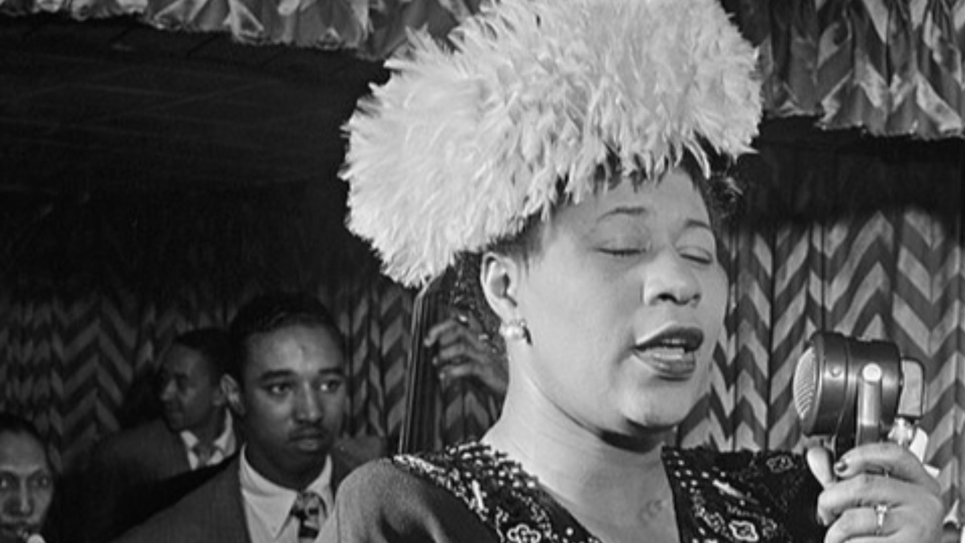 File:Dizzy Gillespie listens to Ella Fitzgerald in September 1947 (cropped).jpg