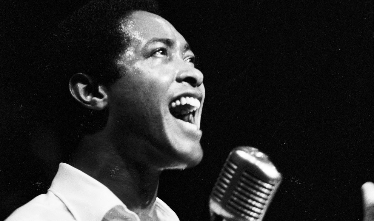 Sam Cooke (1931 – 1964), singer, songwriter and civil-rights activist, on stage with band at New York's Copacabana nightclub, June 1964.