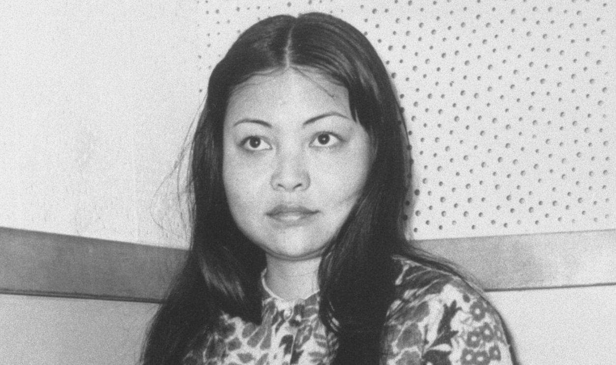 The woman who was with Sam Cooke before his murder, Elisa Boyer, waits for questioning at police headquarters in Los Angeles.