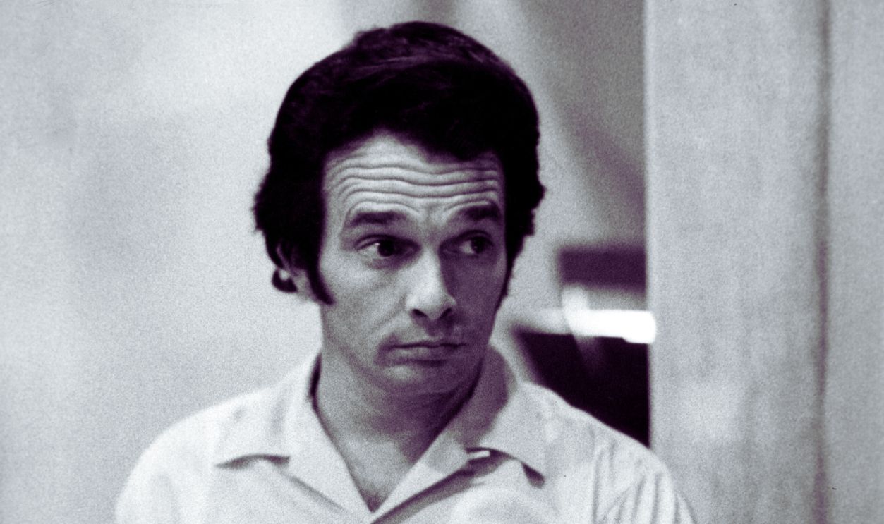 Country singer Merle Haggard pauses for a candid moment in the mid 1970's.