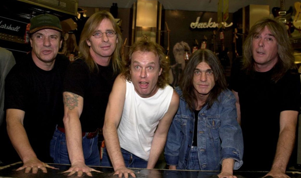 AC-DC Honored At Rock Walk Handprint Ceremony