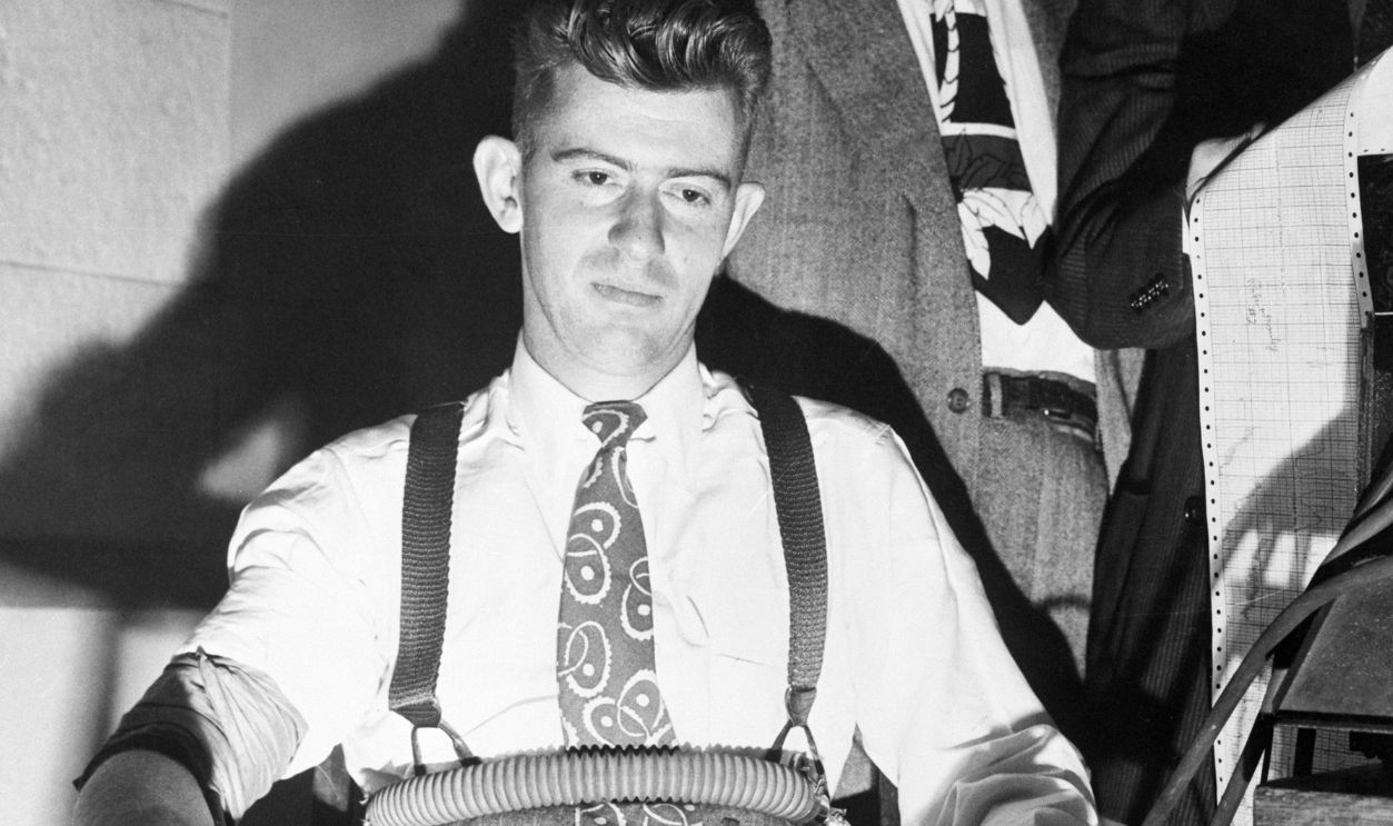 Gettyimages - 514677788, Man Strapped In Seat, Eyes Red, Testifying (Original Caption) 1/22/1947-Los Angeles, CA; Eyes red-rimmed from a sleepless night, but declaring his