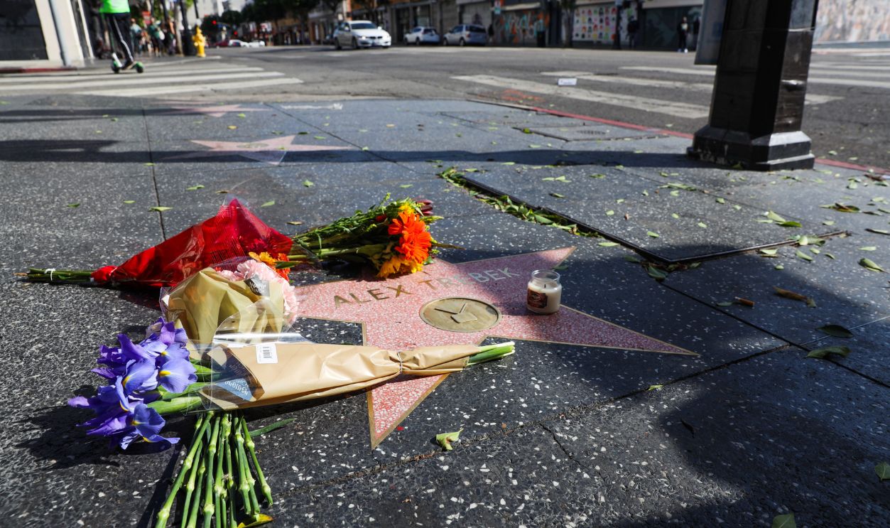 HOLLYWOOD, CALIFORNIA - NOVEMBER 08: Flowers are seen on Alex Trebek's star on the Hollywood Walk of Fame on November 08, 2020 in Hollywood, California. 