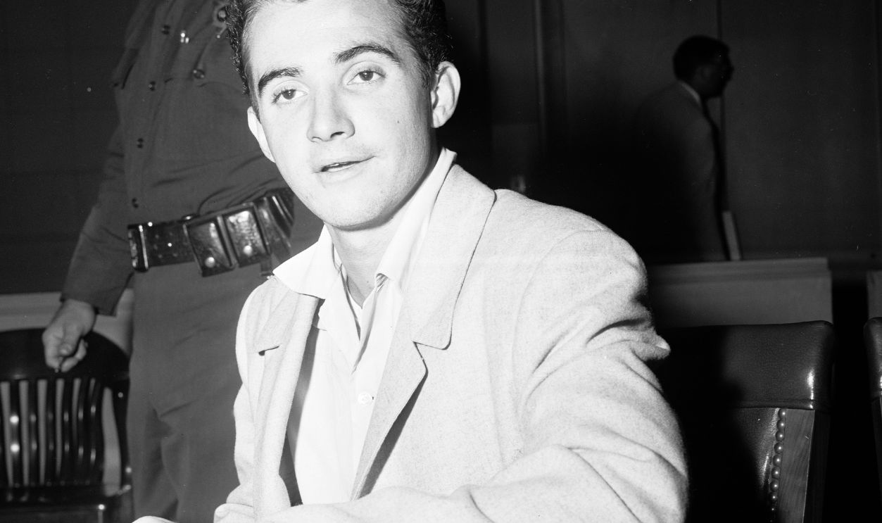 Scotty Beckett surrenders, 1954