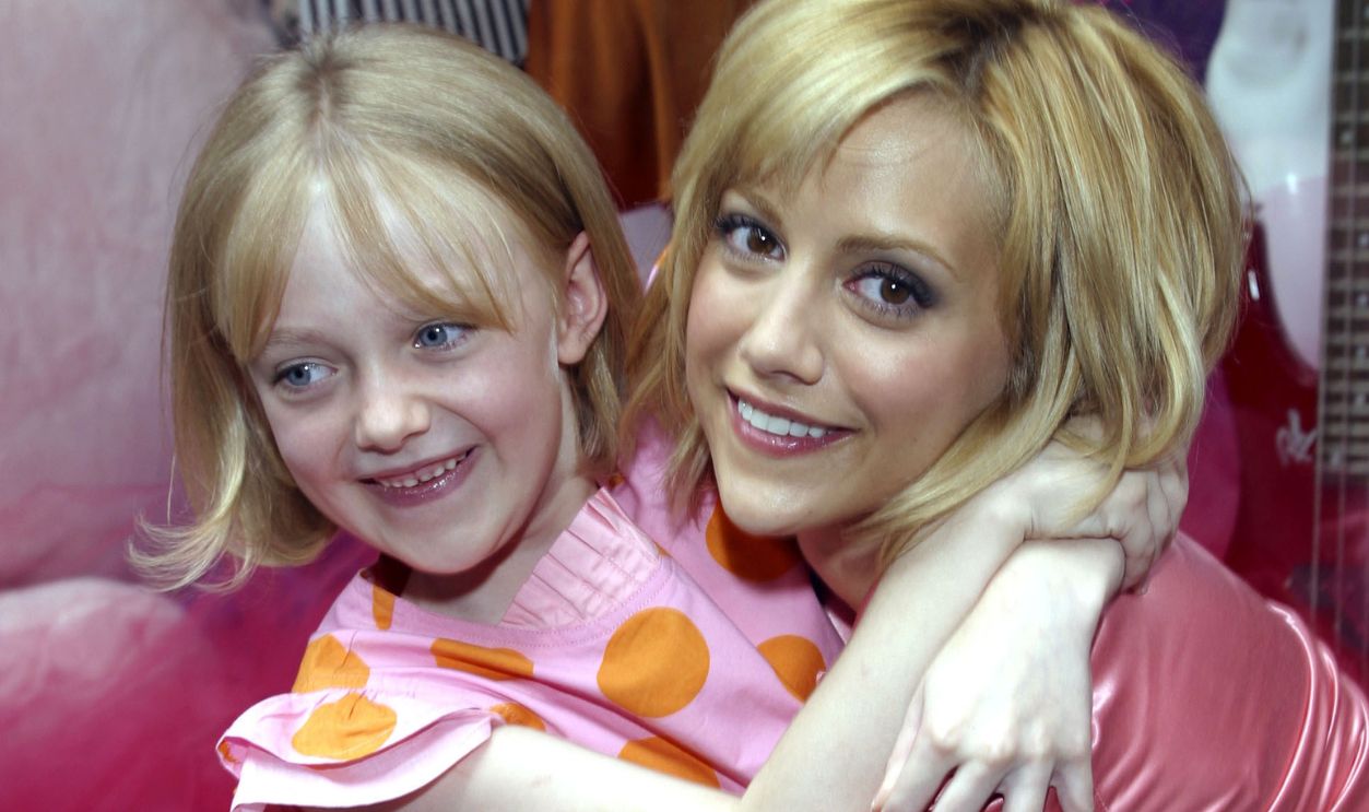 Brittany Murphy and Dakota Fanning during Brittany Murphy Unveils the Exclusive Uptown Girls Window Display at Henri Bendel at Henri Bendel in New York City, New York, United States.