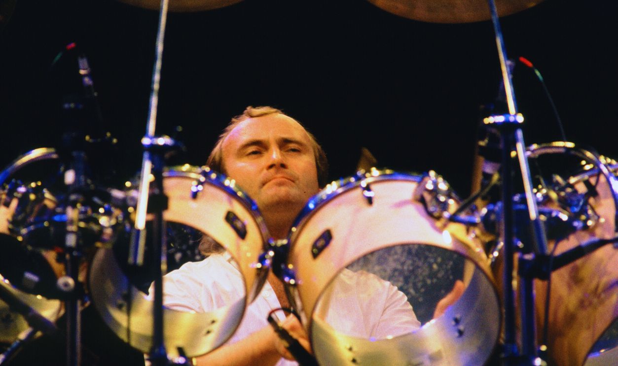 Singer and Musician Phil Collins with Genesis Band performs in concert at Inglewood Forum, October 16, 1986 in Inglewood, California.