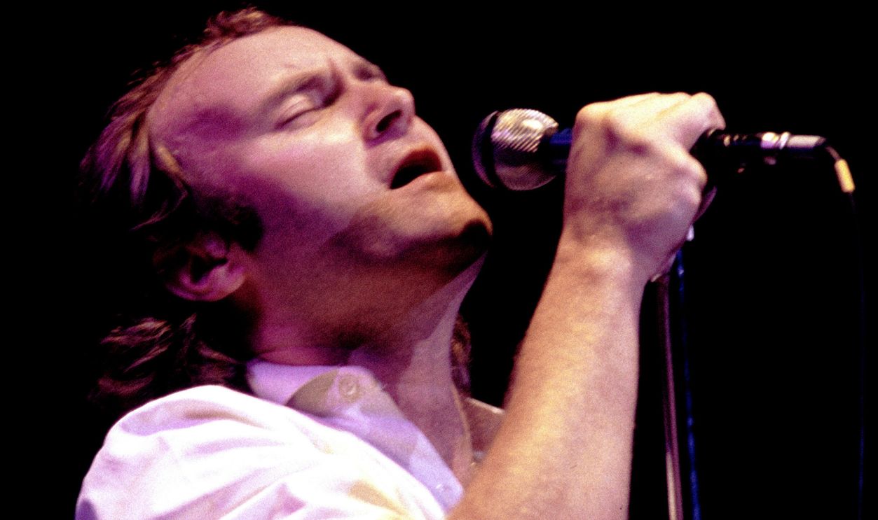 Singer and Musician Phil Collins with Genesis Band performs in concert at Inglewood Forum, October 16, 1986 in Inglewood, California.