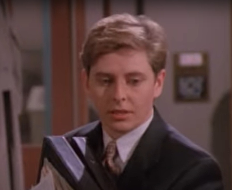 A visually captivating still taken from a pivotal moment in the television series NewsRadio (1995-1999)