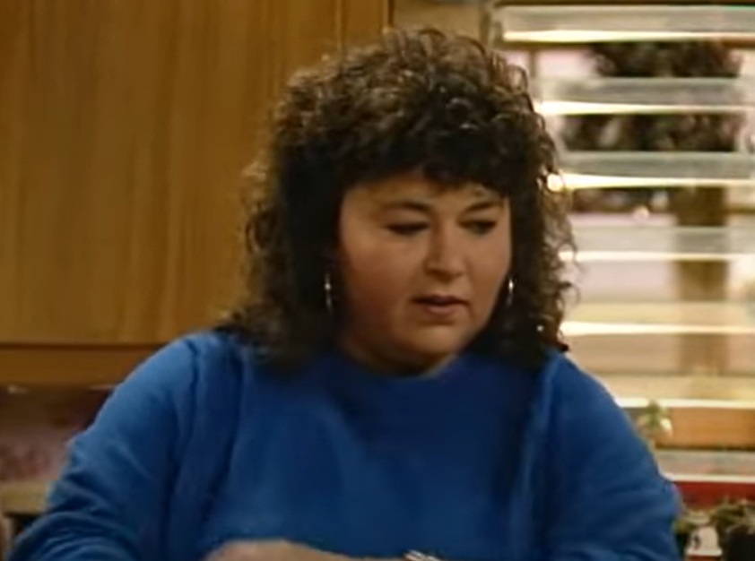 A visually captivating still taken from a pivotal moment in the television series Roseanne (1988-2018)