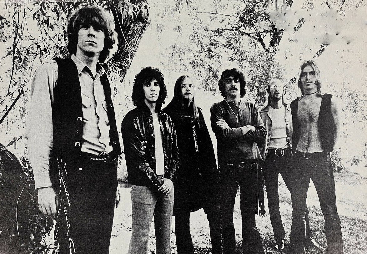 Blues Image posing outdoors for a publicity photograph