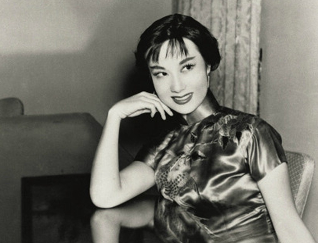 Li Lihua sitting at a table - 1955