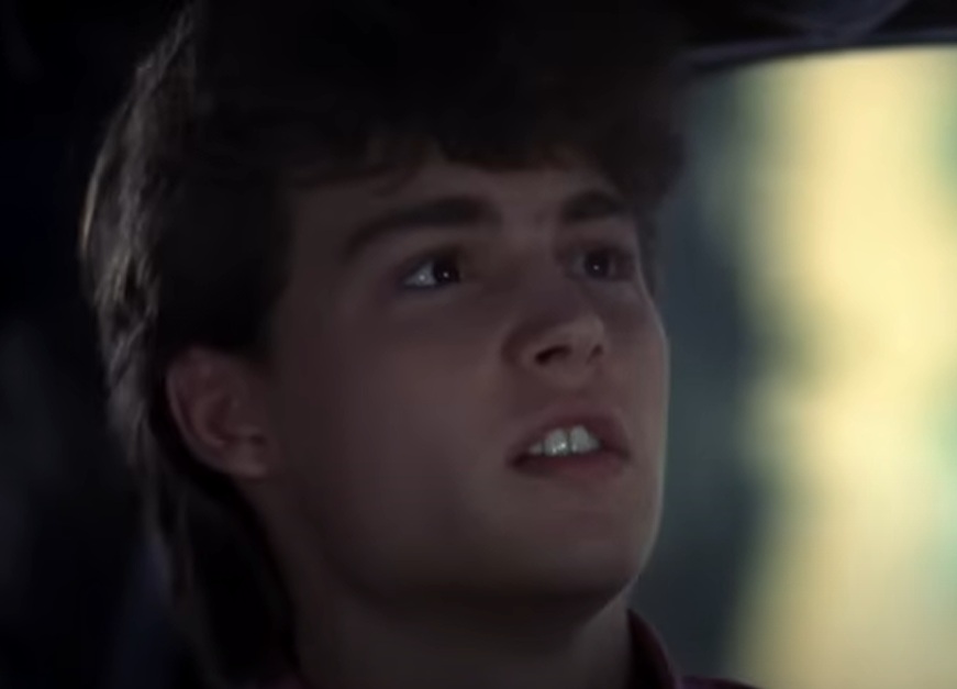 A visually captivating still taken from a pivotal moment in the film A Nightmare on Elm Street (1984)