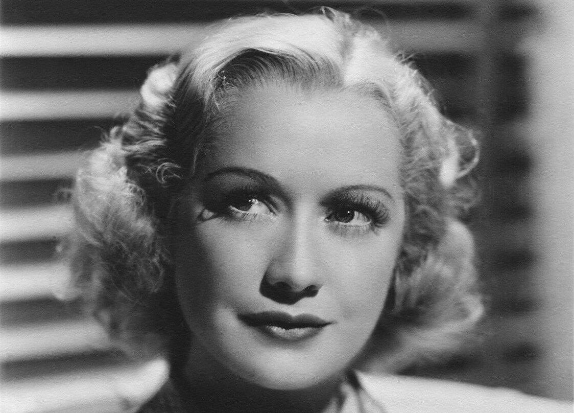 Publicity photo of Miriam Hopkins looking away from the camera