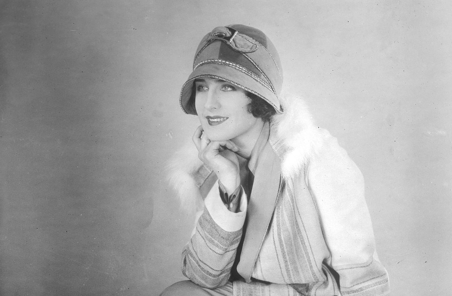 Photograph of Norma Shearer sitting