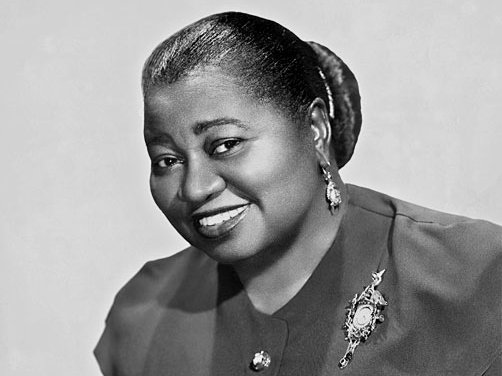 Promotional photograph of actor Hattie McDaniel smiling at the camera