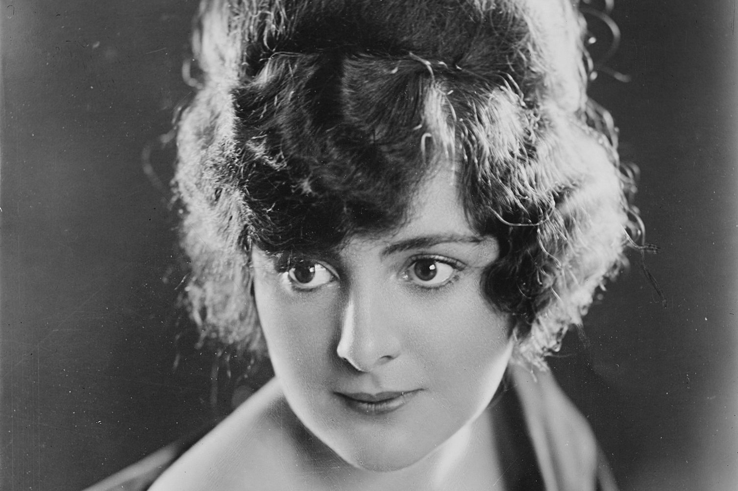 Actress Billie Dove looking away from the camera