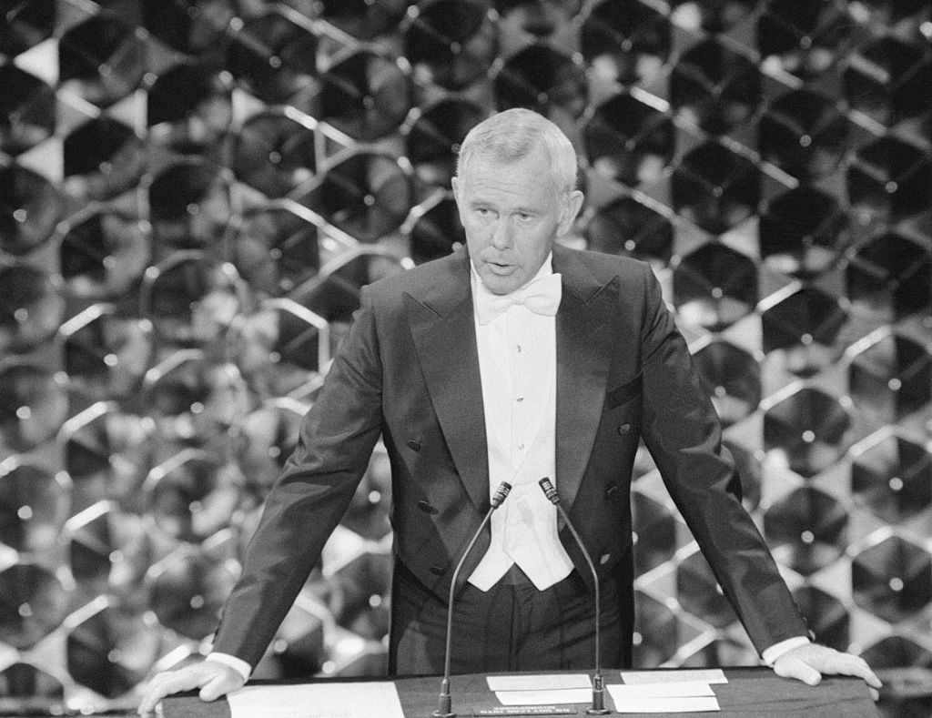 Host Johnny Carson performs onstage during the Annual Academy Awards
