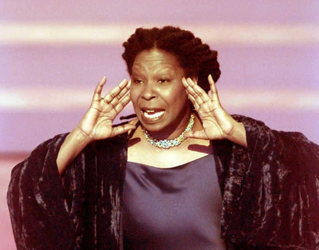 Host Whoopi Goldberg performs onstage during the Annual Academy Awards