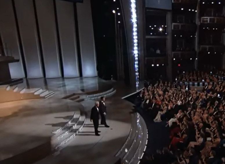 Hosts Steve Martin and Alec Baldwin performs onstage during the Annual Academy Awards