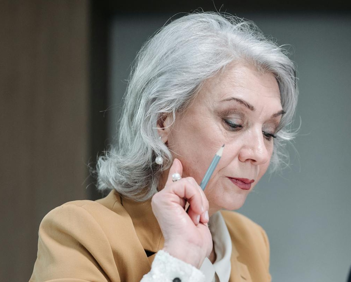 Business Woman Holding a Pencil