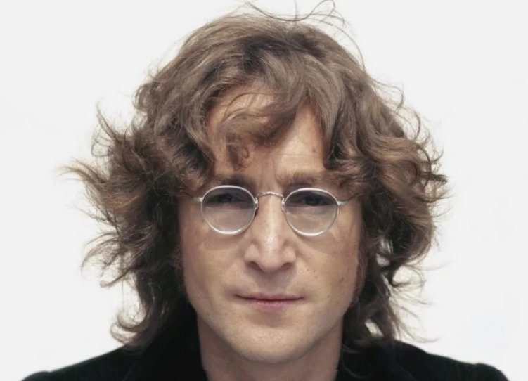 Portrait Photo of John Lennon facing the camera 1974