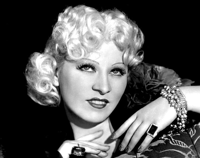 Grayscale Portrait Photo of American actress Mae West 1936