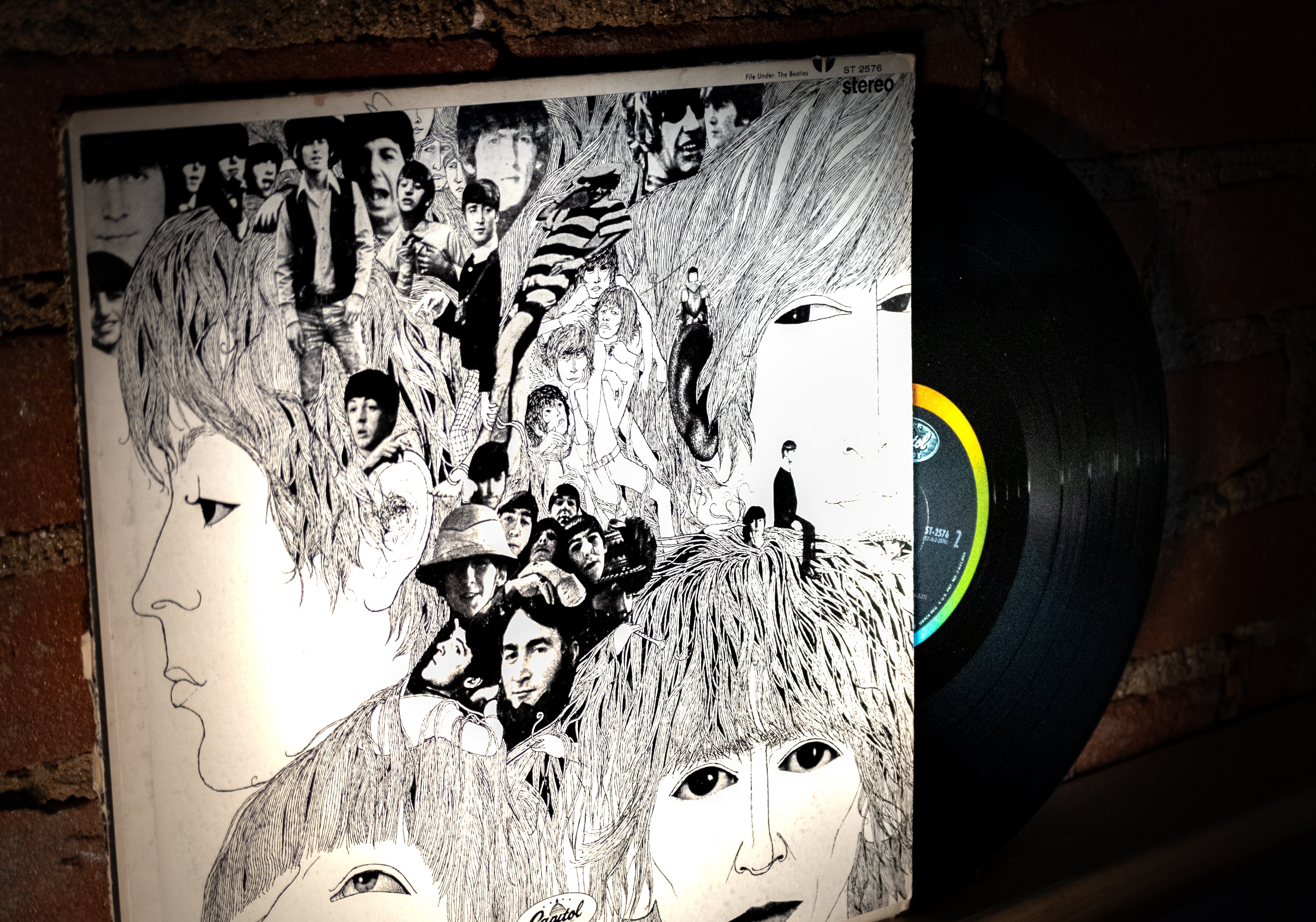 Closeup of The Beatles Revolver Vinyl Record on Dark Background