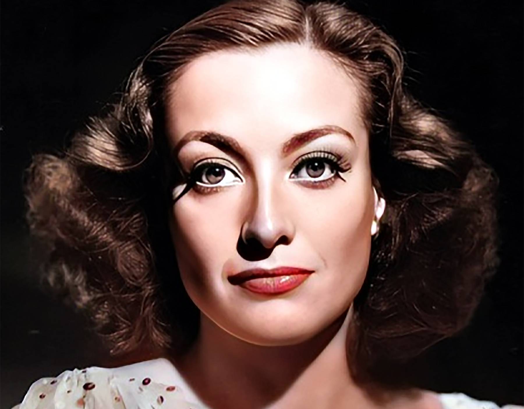 Joan Crawford In 1936 in white dress