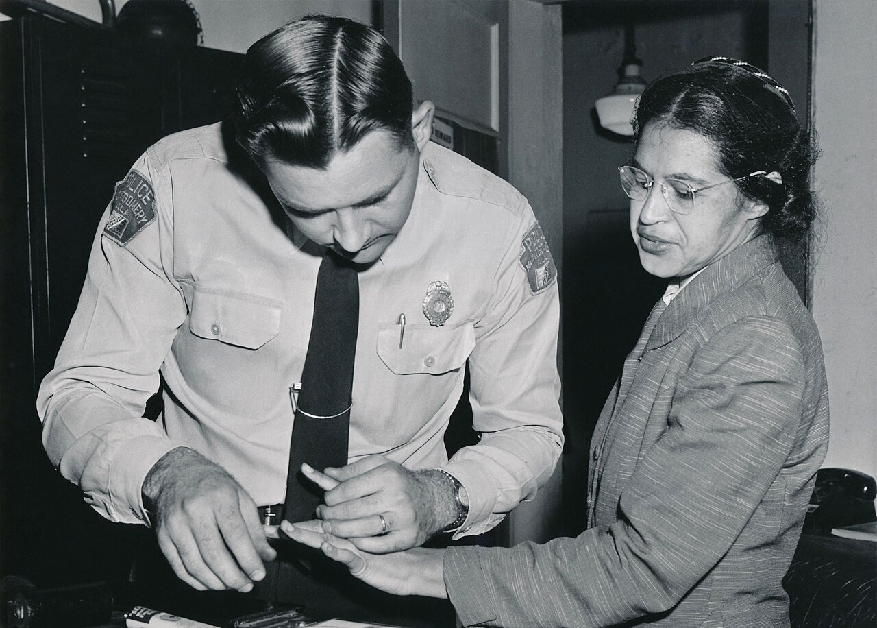 Rosa Parks being fingerprinted by Deputy Sheriff