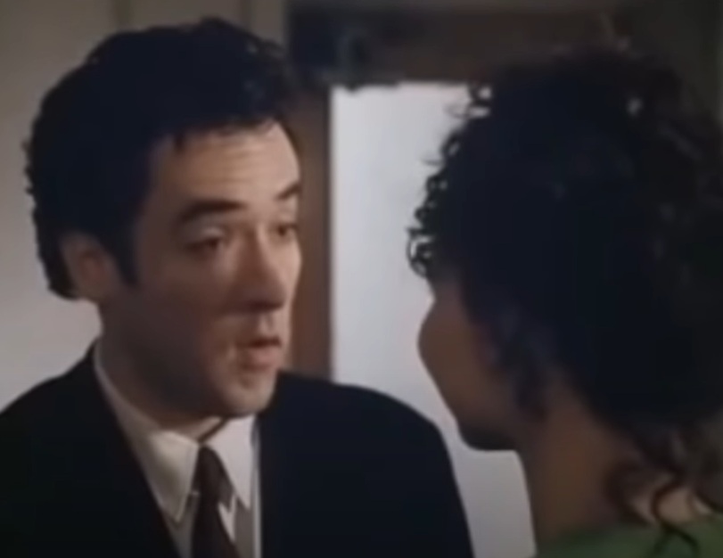 A visually captivating still taken from a pivotal moment in the film Grosse Pointe Blank (1997)