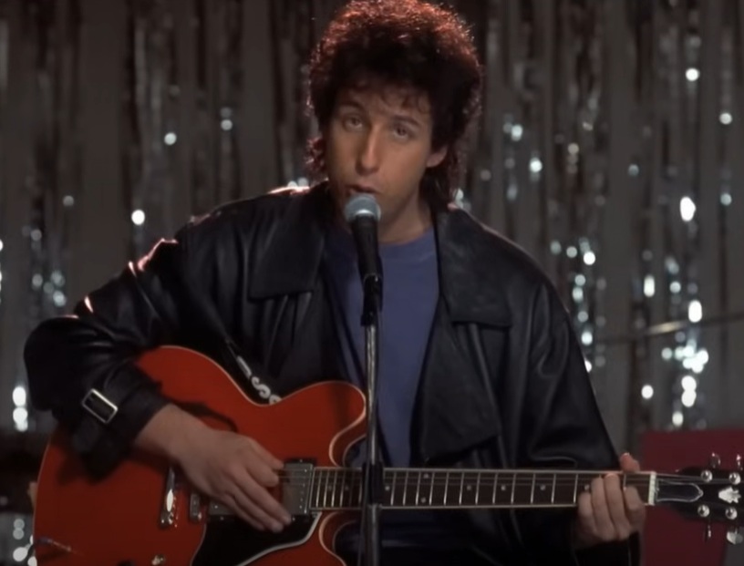 A visually captivating still taken from a pivotal moment in the film The Wedding Singer (1998)