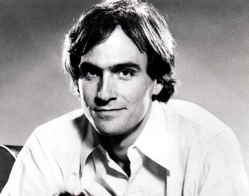 Grayscale Portrait Photo of singer-songwriter James Taylor