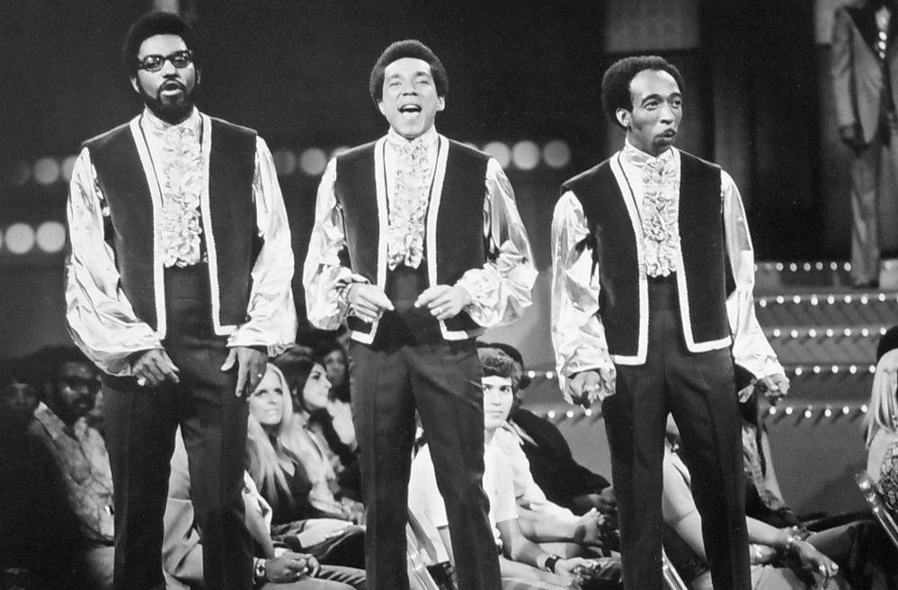 Photo of Smokey Robinson (center) and The Miracles