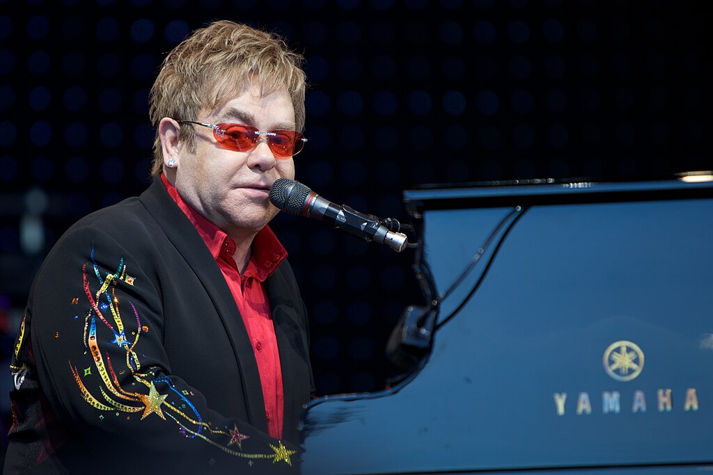 Portrait Photo of British singer, songwriter Elton John on stage