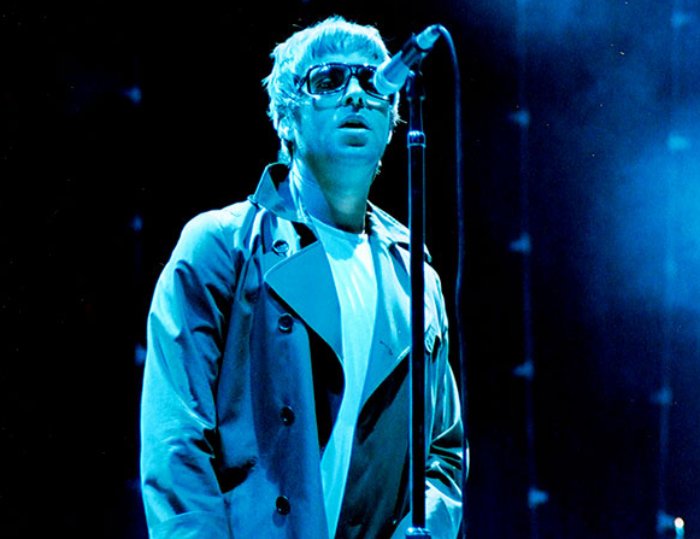 Portrait Photo of English singer and songwriter Liam Gallagher on stage