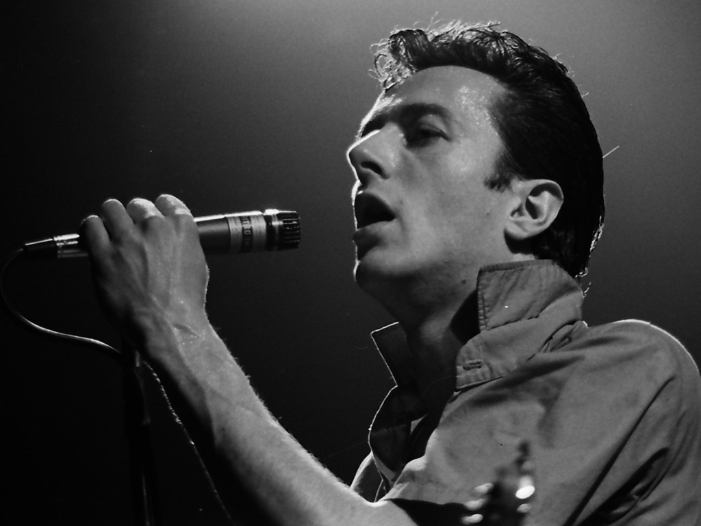 Joe Strummer performing with the Clash at the Tower Theater