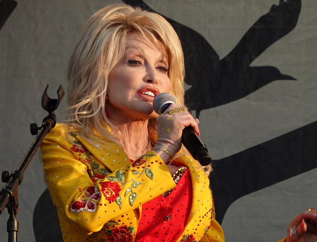 Portrait Photo of the American singer Dolly Parton plays Newport Folk Festival