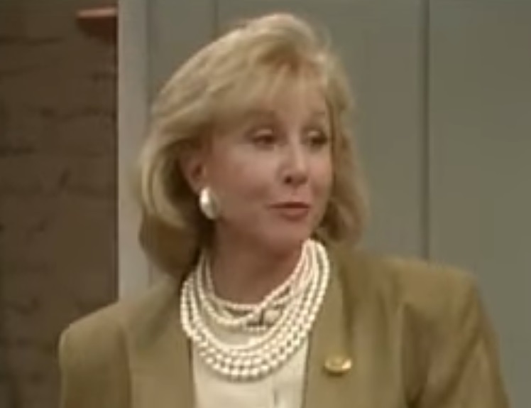 A visually captivating still taken from a pivotal moment in the television series Living Dolls (1989)