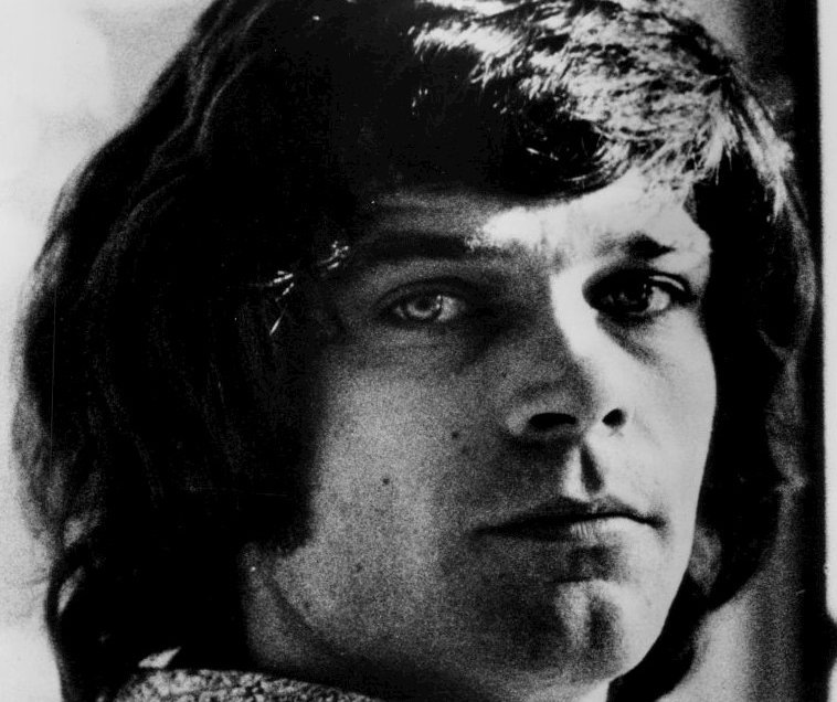 Grayscale Portrait Photo of American singer Billy Joe Thomas facing the camera