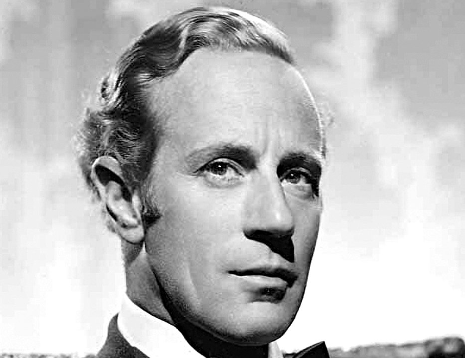 Grayscale Portrait Photo of English actor and director Leslie Howard