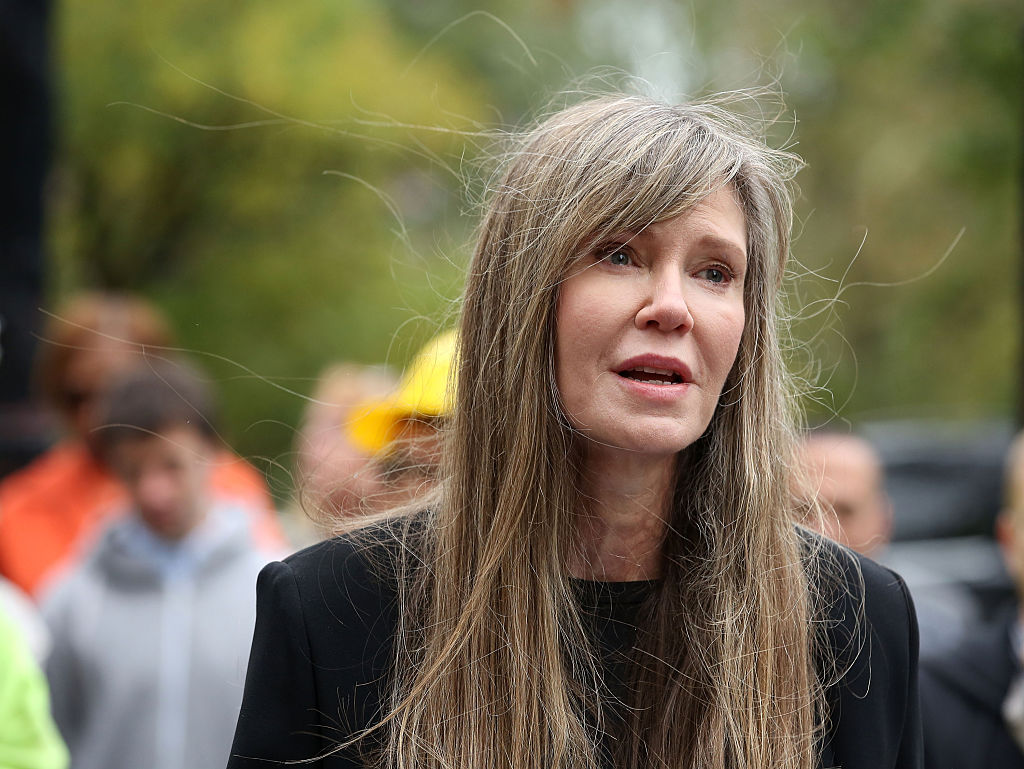 Sally Wade delivers remarks at the George Carlin Way