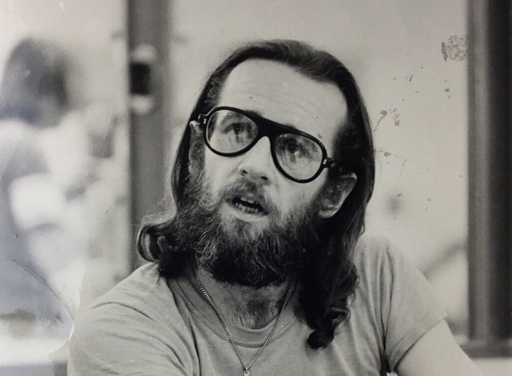 Grayscale Portrait Photo of American stand-up comedian George Carlin 1972