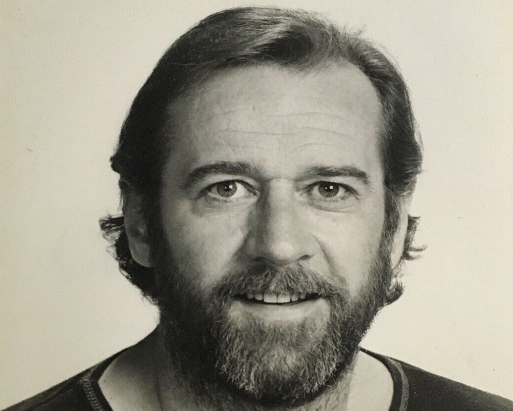 Grayscale Portrait Photo of American stand-up comedian and author George Carlin