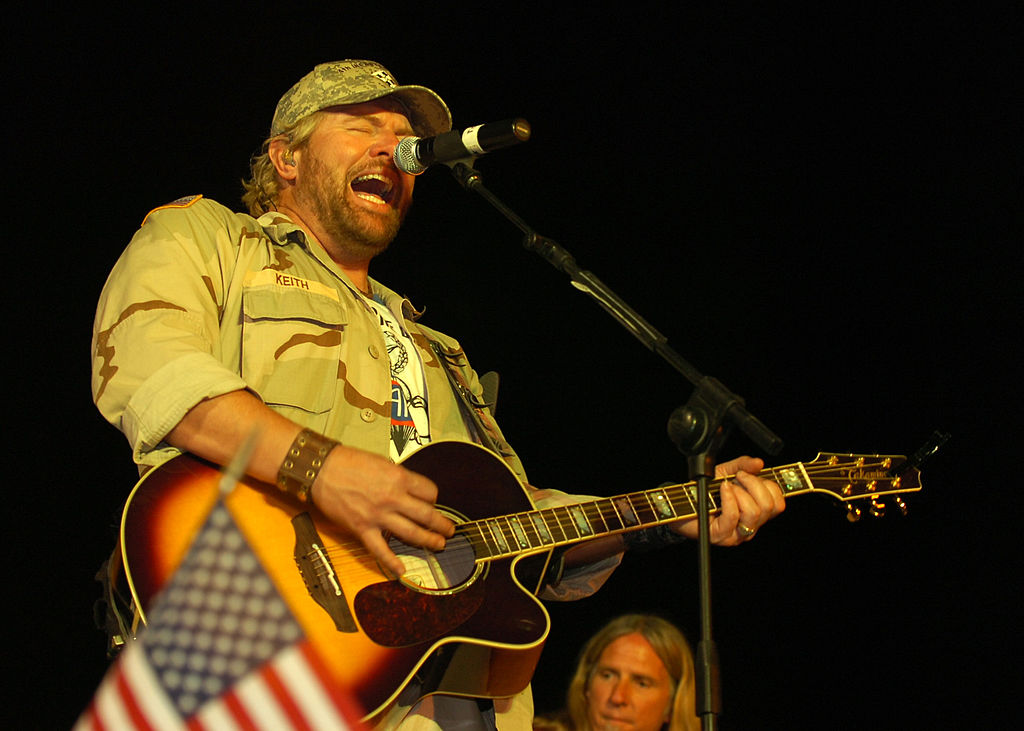 Toby Keith performs for service members at the Camp Liberty Post Exchange Stage