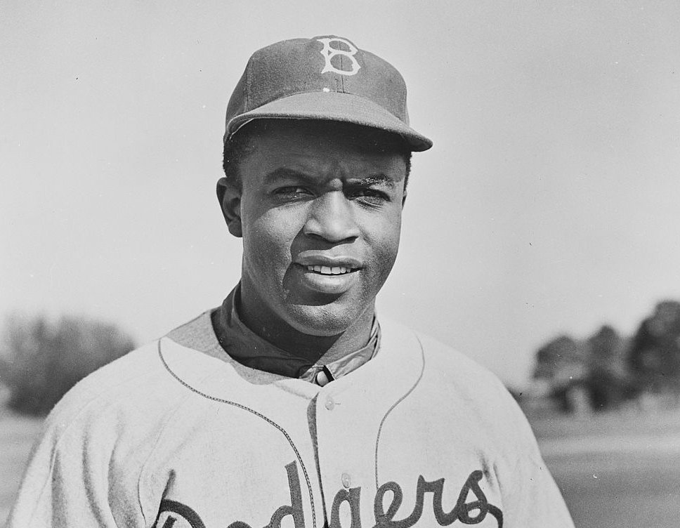 Grayscale Portrait Photo of Jackie Robinson in his Brooklyn Dodgers Uniform