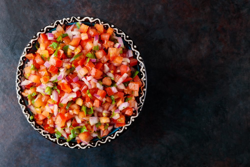 Close Up Photo of Pico de Gallo on a dark background