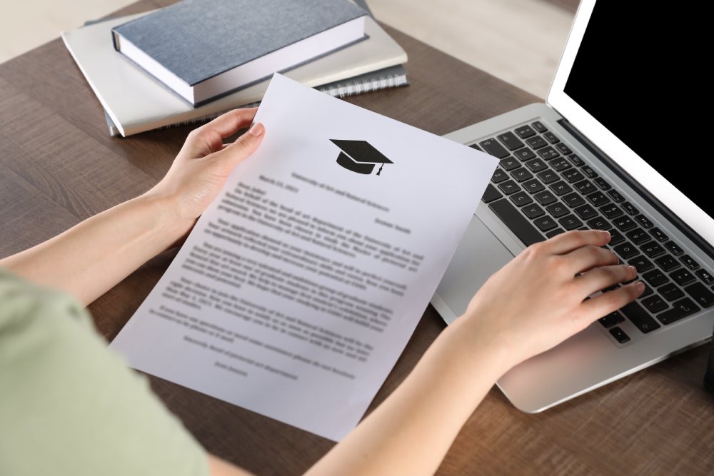 Close Up Photo of Student with acceptance letter from university