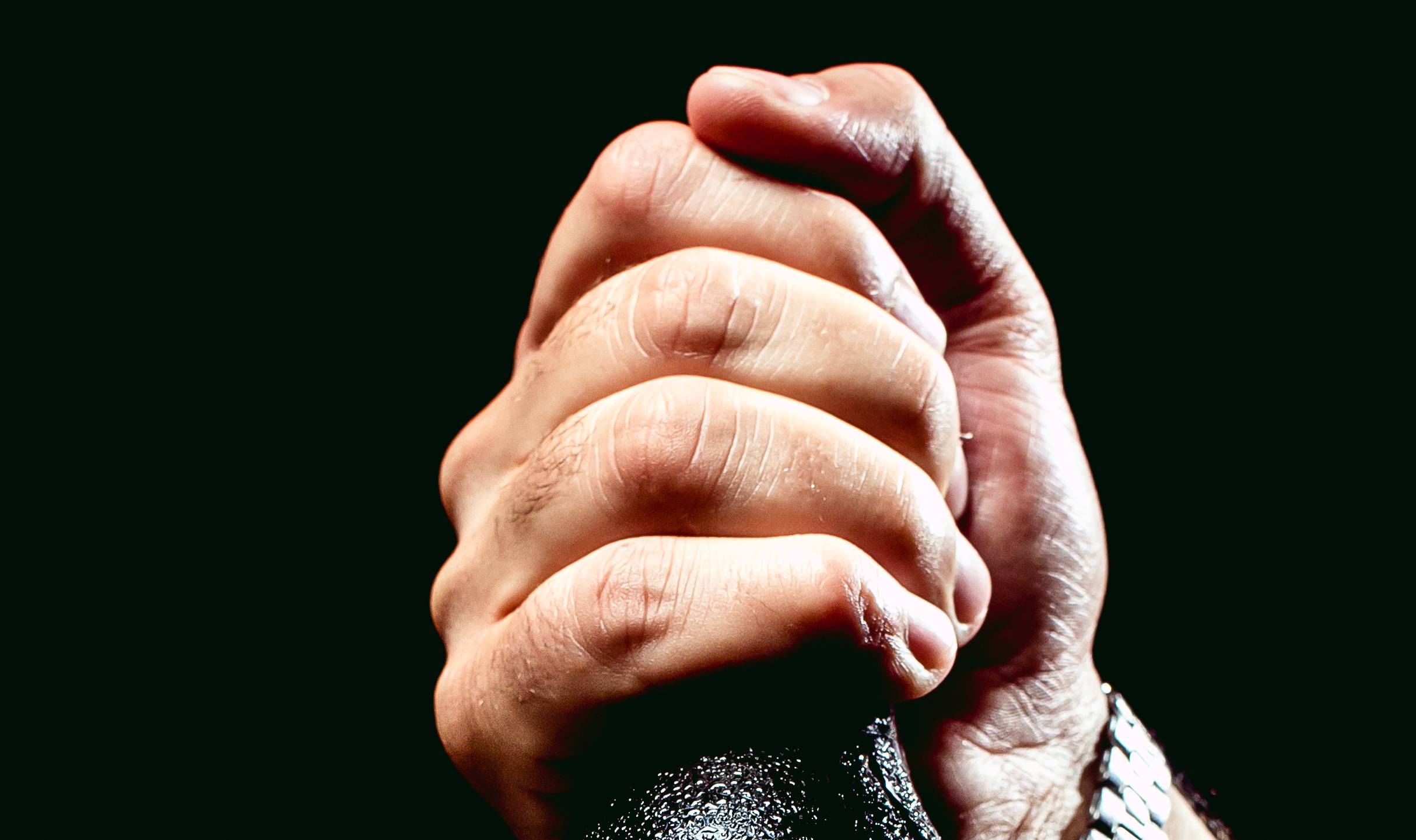 man holding a bottle of Einsebhan beer